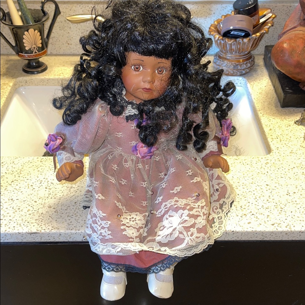 Unique Vintage Doll with Black Hair and Purple Dress